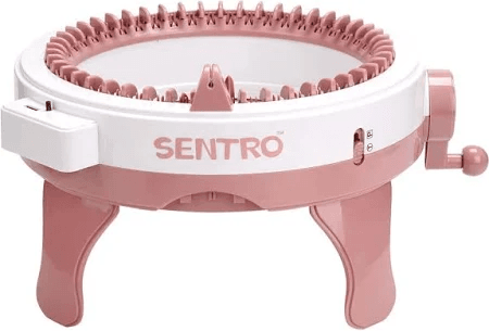 A photo of a 14 inch plastic donut shaped object with four plastic feet.